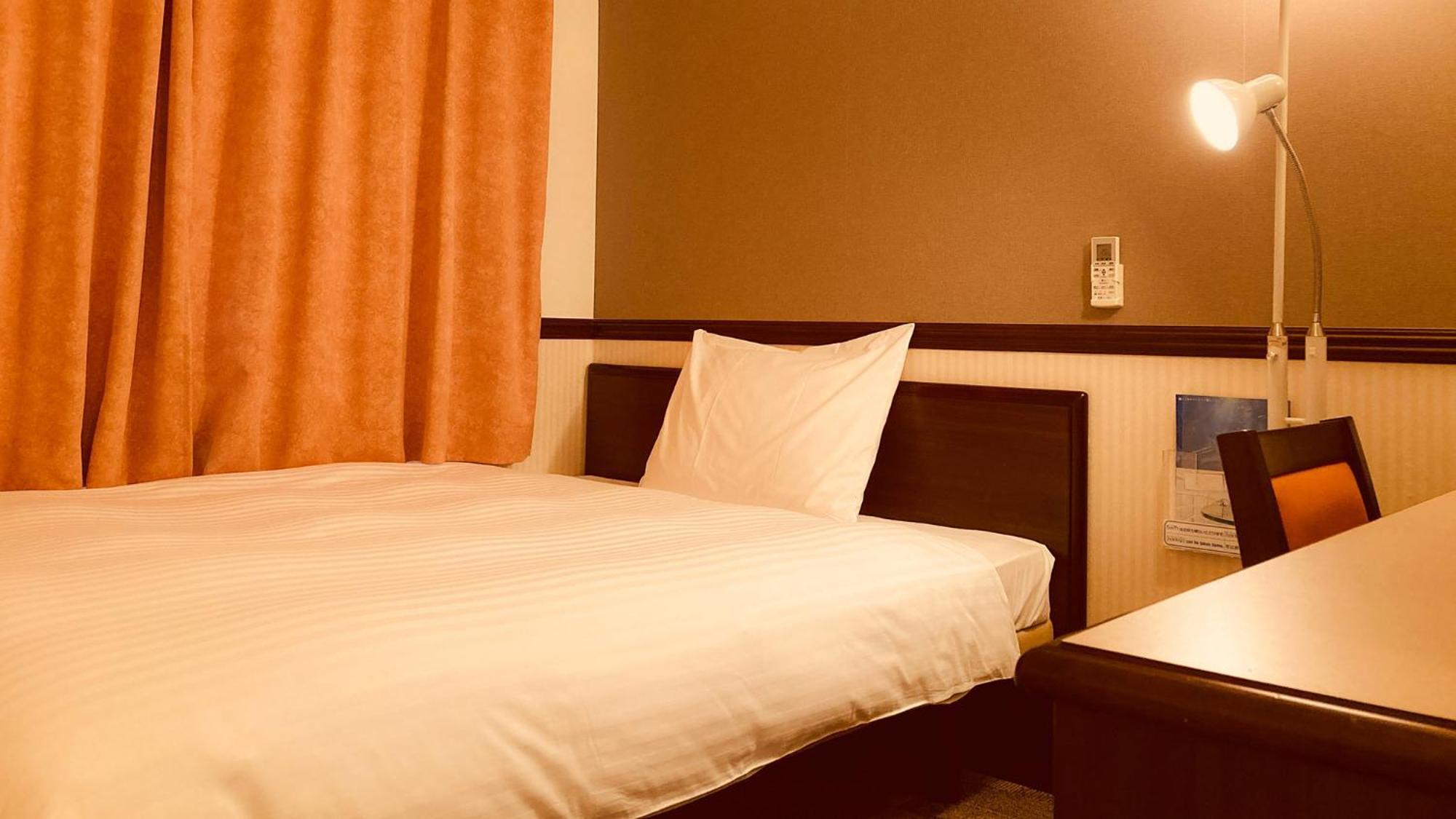 Toyoko Inn Tsudanuma-Eki Kita-Guchi Funabashi Rum bild
