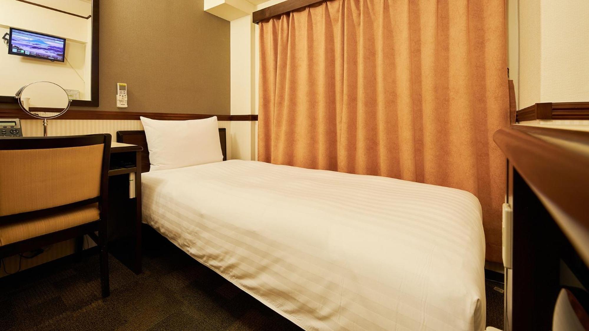 Toyoko Inn Tsudanuma-Eki Kita-Guchi Funabashi Rum bild